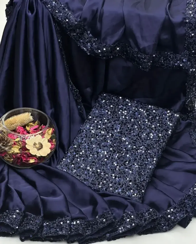 NEW PARTY WEAR FANCY SAREE COLLECTION  Shamoze Silk Sequence Border Bottom Flyer 4 Side Sequence Border Palla Along With Sequence Work Blouse & Sleeves Saree. Measurement  Length 7 Yards. Width 1 Meter.  Blouse & Sleeves Fabric  1 Yard Width  1.5 Yard Length