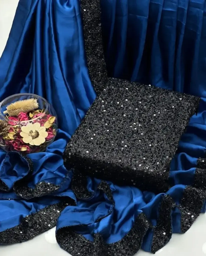 NEW PARTY WEAR FANCY SAREE COLLECTION  Shamoze Silk Sequence Border Bottom Flyer 4 Side Sequence Border Palla Along With Sequence Work Blouse & Sleeves Saree. Measurement  Length 7 Yards. Width 1 Meter.  Blouse & Sleeves Fabric  1 Yard Width  1.5 Yard Length