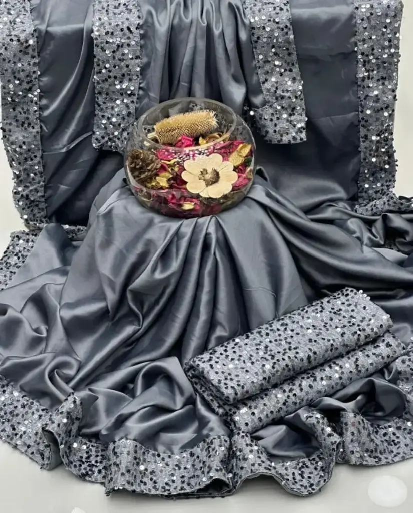 NEW PARTY WEAR FANCY SAREE COLLECTION  Shamoze Silk Sequence Border Bottom Flyer 4 Side Sequence Border Palla Along With Sequence Work Blouse & Sleeves Saree. Measurement  Length 7 Yards. Width 1 Meter.  Blouse & Sleeves Fabric  1 Yard Width  1.5 Yard Length