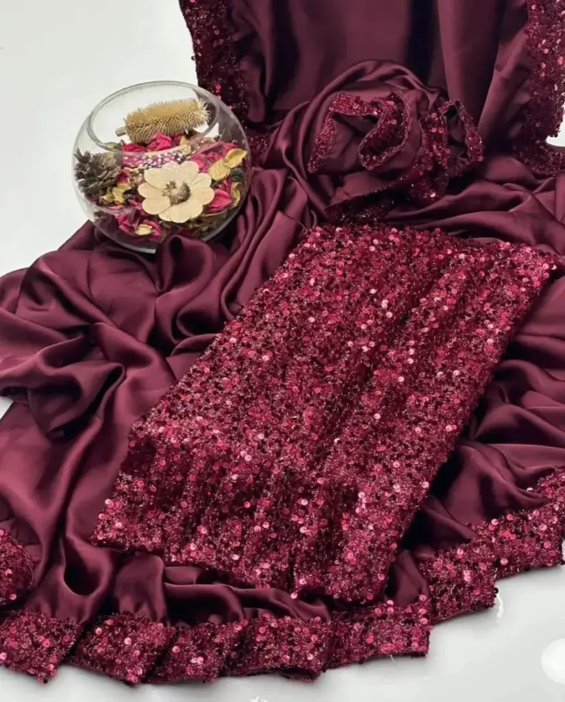 NEW PARTY WEAR FANCY SAREE COLLECTION  Shamoze Silk Sequence Border Bottom Flyer 4 Side Sequence Border Palla Along With Sequence Work Blouse & Sleeves Saree. Measurement  Length 7 Yards. Width 1 Meter.  Blouse & Sleeves Fabric  1 Yard Width  1.5 Yard Length